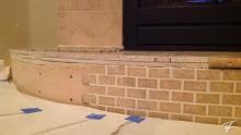 Wrapping the tile along the front of the hearth