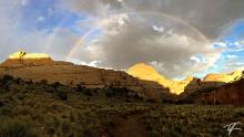 A double rainbow sunset over the Capitol Dome in Capitol Reef National Park