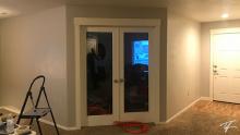 New wall color with new casing around the French doors